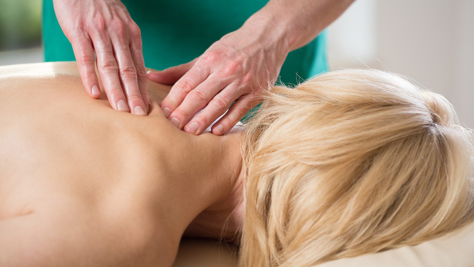 physical-therapist-s-hands-massaging-tense-vertebr-2025-10-09-17-00-00-utc