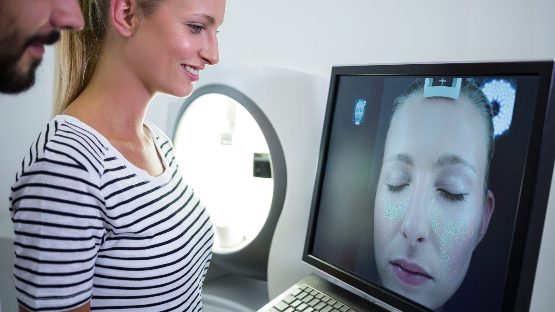 woman-looking-mri-scan-report-computer-screen (1)